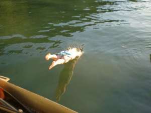 John dives in the frigid waters of Scenery Cove Scenery Cove, Alaska, American Safary cruise
