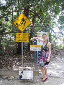 OLYMPUS DIGITAL CAMERA Sheri by the beach sign