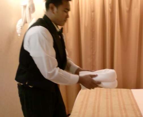 fold rolled towel fold rolled towel in half