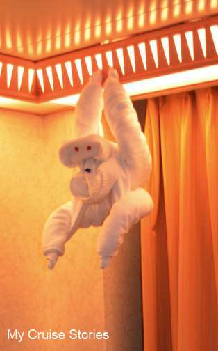 towel origami, how to make a towel monkey