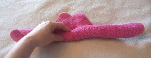 how to fold a washcloth pig tail