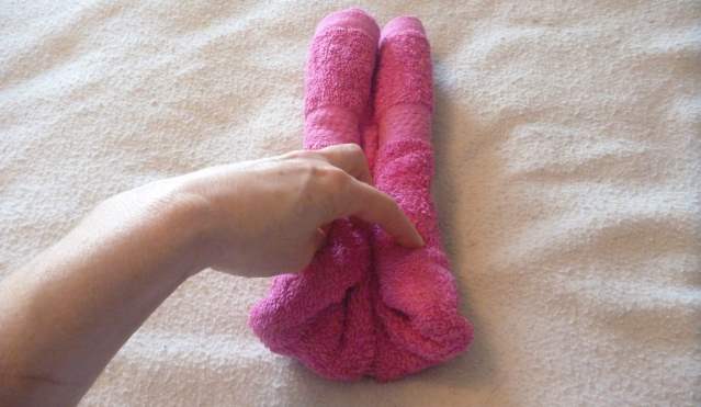 folding pig head from a hand towel