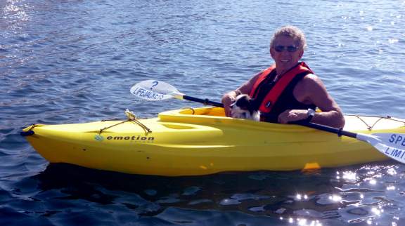 dog on a kayak
