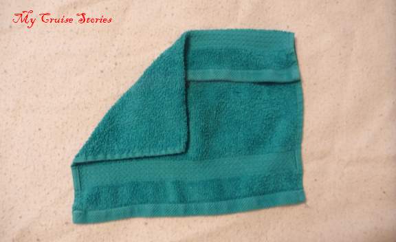 folding a washcloth into a turtle head