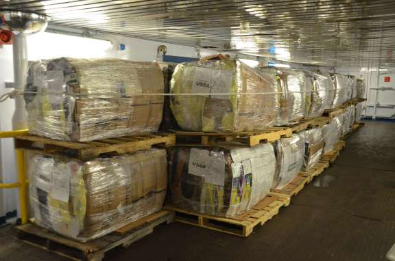 bales of recycling waiting to unload in port