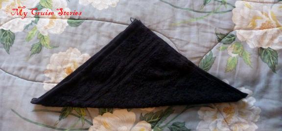 making a washcloth penguin head