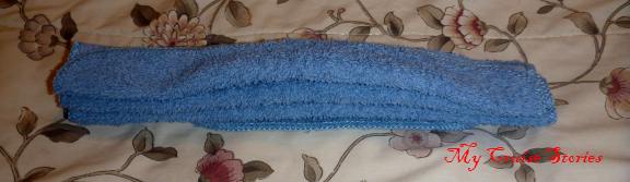 folding a washcloth into a bird tail