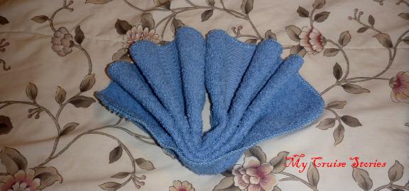folding a washcloth into a bird tail