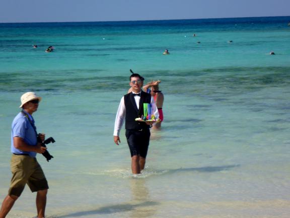 beach waiter on Great Stirrup Cay