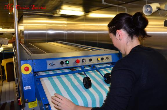 folding towels on a cruise ship