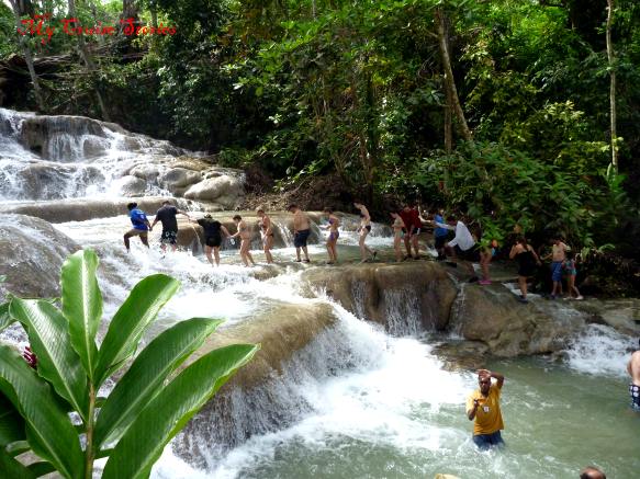 people climbing Dunns River Falls