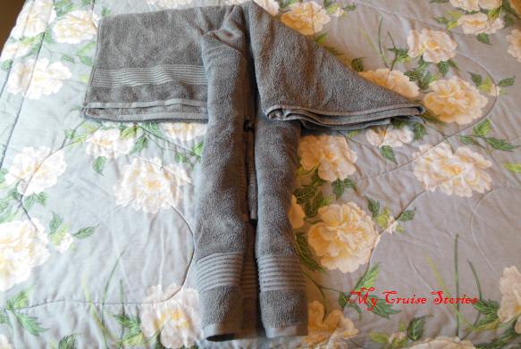 how to fold towels into a seal