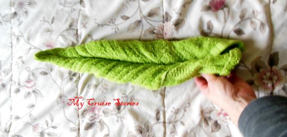 how to fold a towel into a squid