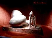 statues of odd shaped women reading fill one alcove on the MSC Divina