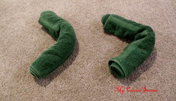 roll two hand towels for crocodile legs