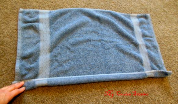 folding a towel into dragon wings