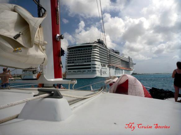 cruise ship and sailboat