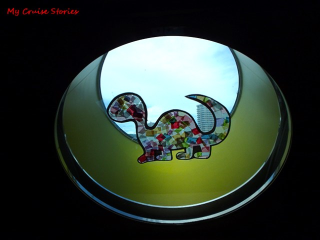 dinosaur in a porthole