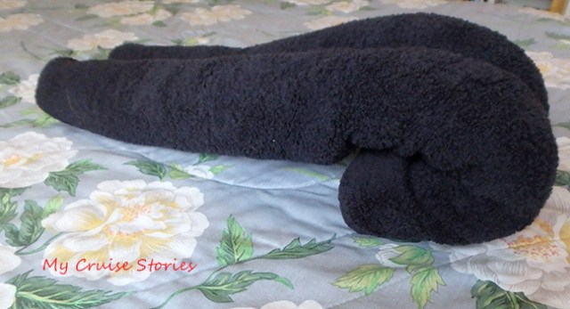 folding a rolled towel