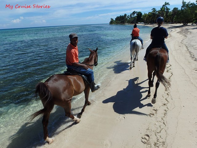 riding horses on the beach in Jamaica