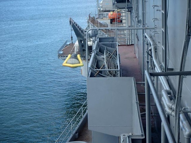 space capsule on an aircraft carrier