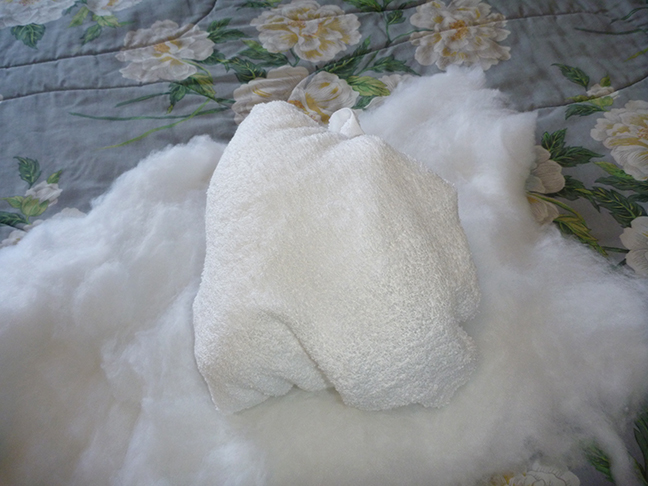 making a towel into a snowball