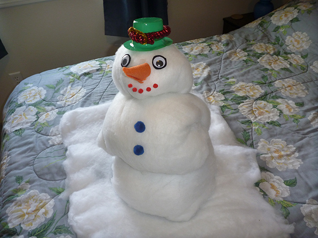 how to fold a towel snowman