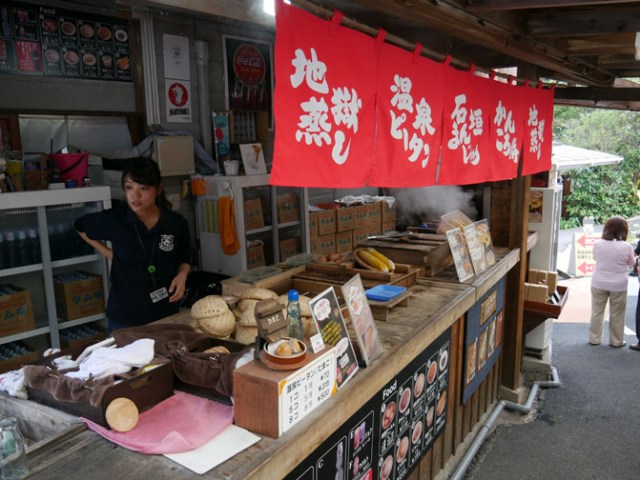 food stand selling food steamed in a hot spring